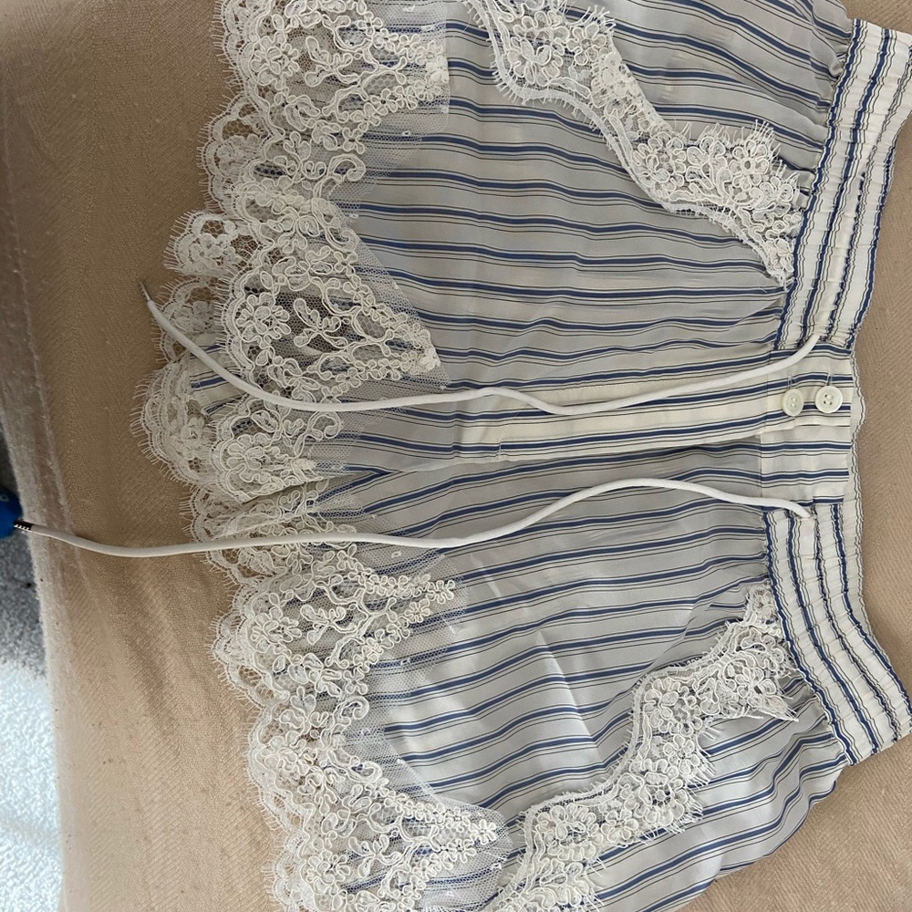 Sacai pinstripe shorts with lace inserts Size 4 which is XL
